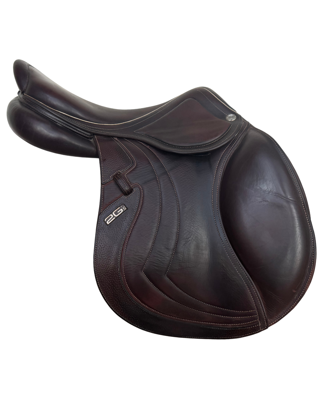 Brown leather saddle on a white background with 2Gs