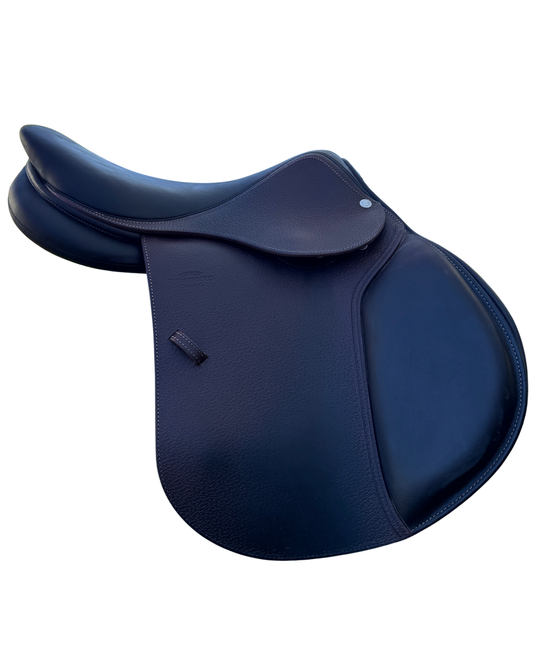Navy blue leather luxury saddle on a white background